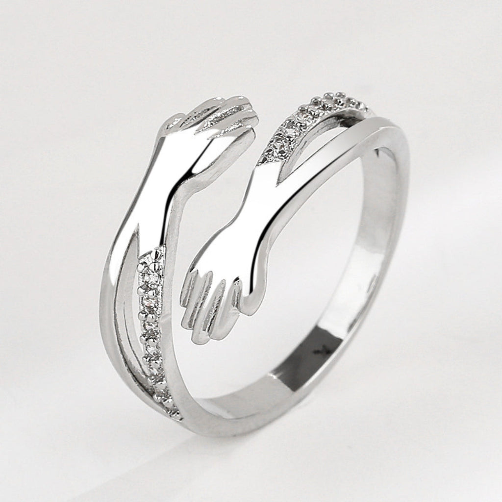 Verstellbarer Hug-Ring mit Zirkonia in Gold und Silber