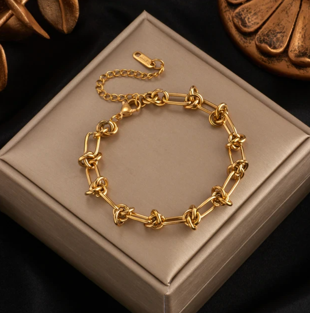 Armbånd i 18 karat gull med modernistisk lenke