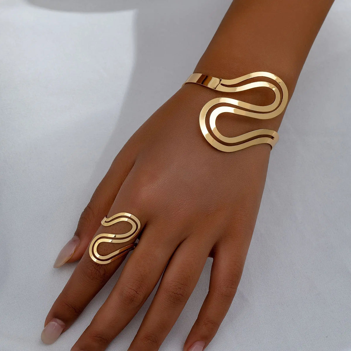 Set di bracciale e anello moderni regolabili a spirale