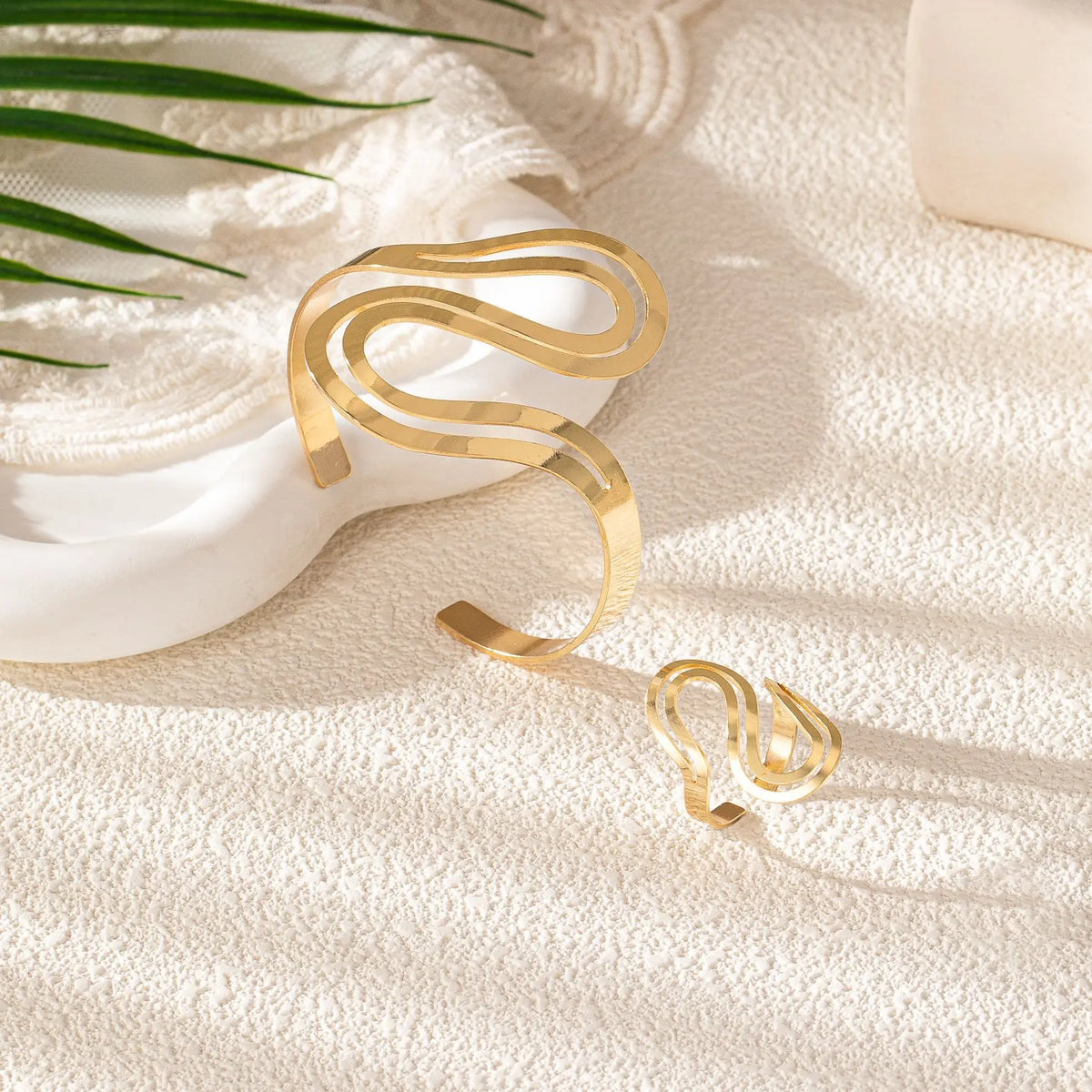 Set di bracciale e anello moderni regolabili a spirale