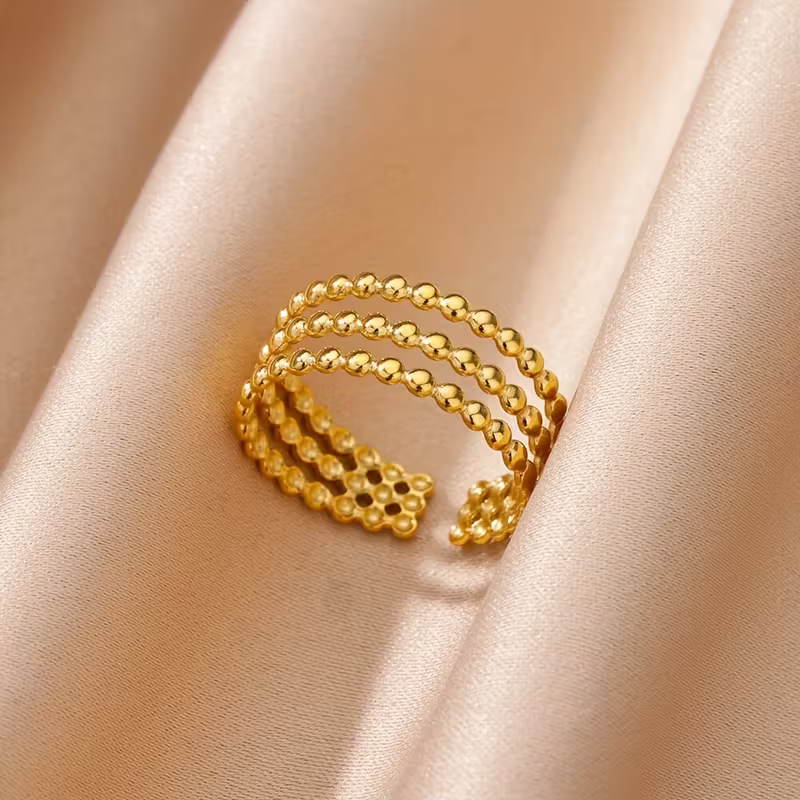 Anello con perline orbitale regolabile