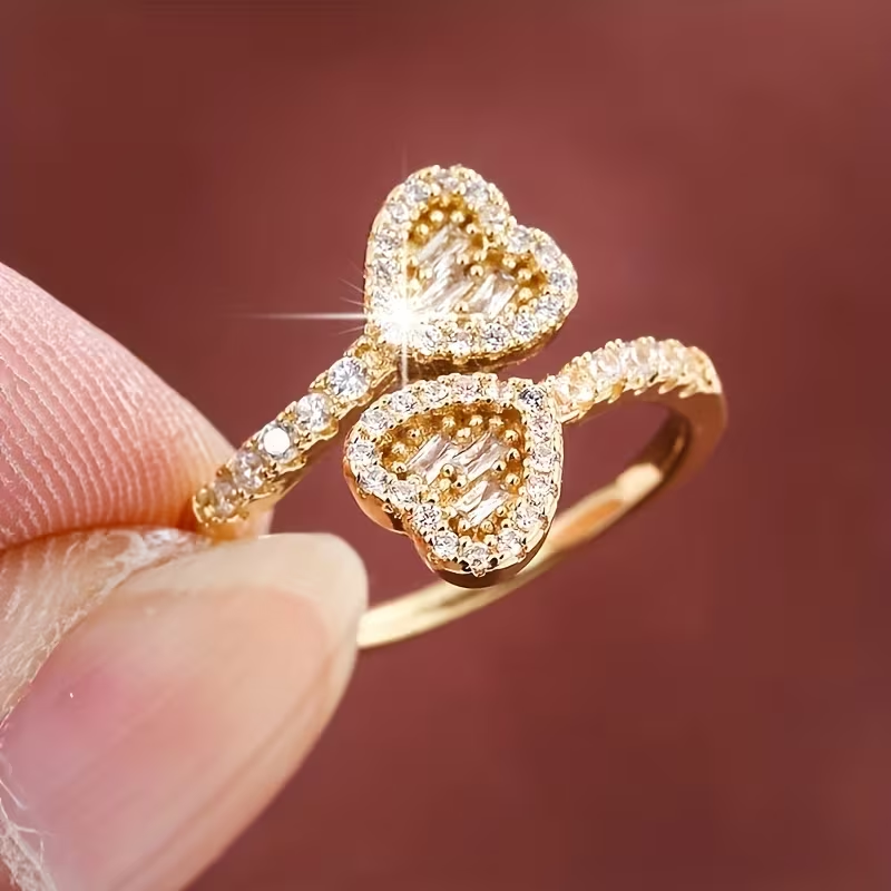 Justerbar hjärtformad ring i glänsande guld
