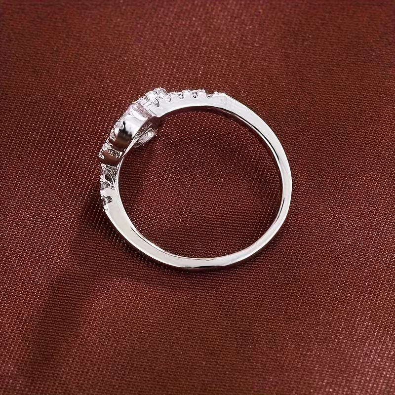 Justerbar hjärtformad ring i glänsande guld