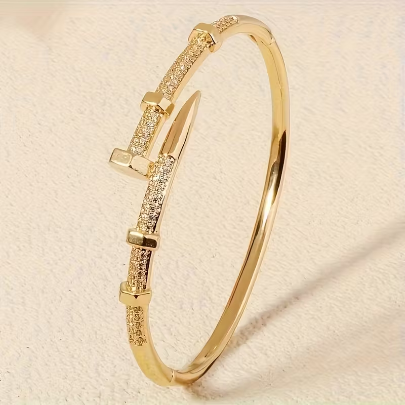 Bracciale aperto regolabile in oro scintillante
