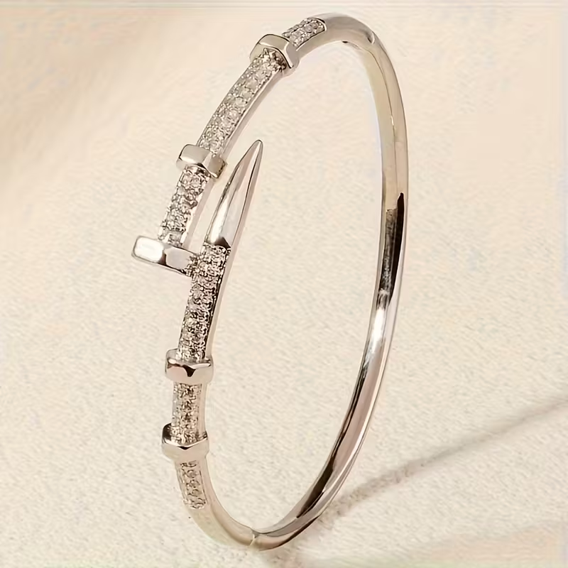 Bracciale aperto regolabile in oro scintillante
